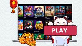 Maneki cat holding a play button with games in the background.