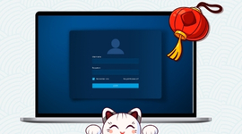 A laptop screen showing a login form with username and password fields. A cartoon cat is below.