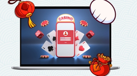 A red smartphone with a casino logo on its screen and a user login form.