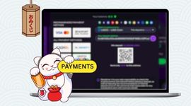 Laptop screen showing casino payment methods with happy cat, red wallet and a lantern decoration