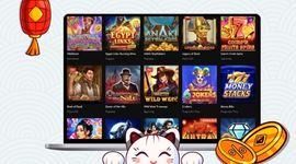Cartoon cat in front of a laptop screen showing casino games page with red lantern and gold coins
