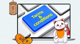 A laptop keyboard with a large blue "Terms & Conditions" key and a Maneki-neko cat.