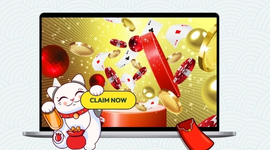 A laptop screen showing coins, playing cards, and a 