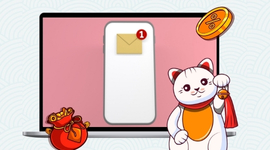 A laptop screen displays a mobile phone with an email notification, and a cartoon cat holds a bell.